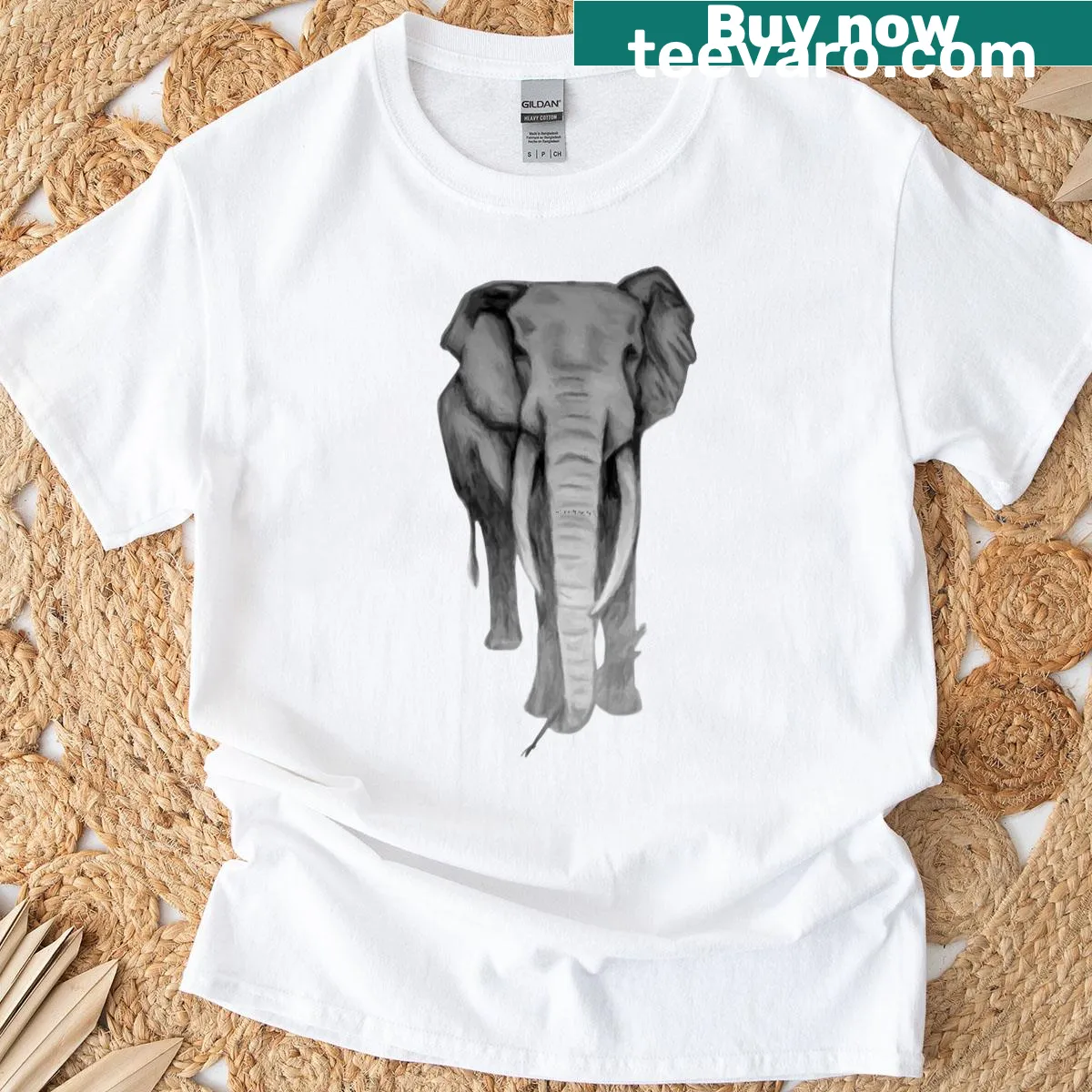 Illustrated t-shirt featuring a majestic elephant leading her herd — on a men's t-shirt