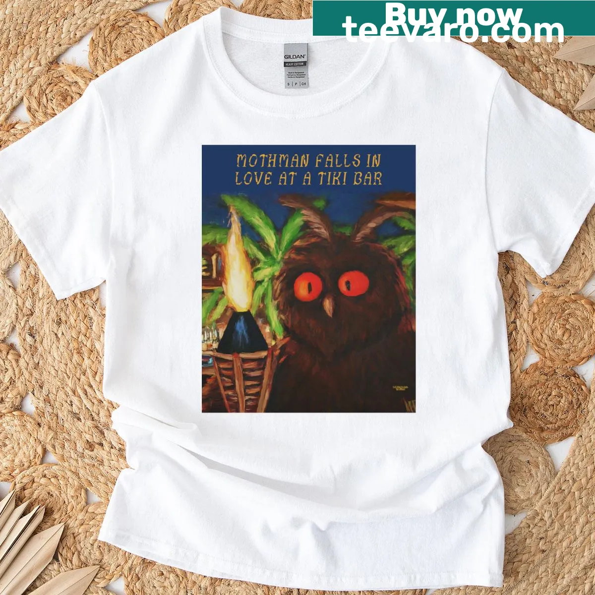 Playful illustration of Mothman at a tiki bar t-shirt — on a men's t-shirt