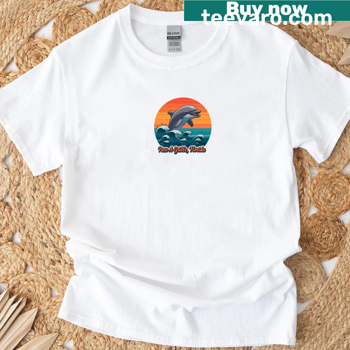 Retro beach art T-shirt featuring dolphins and sunset waves — on a men's t-shirt