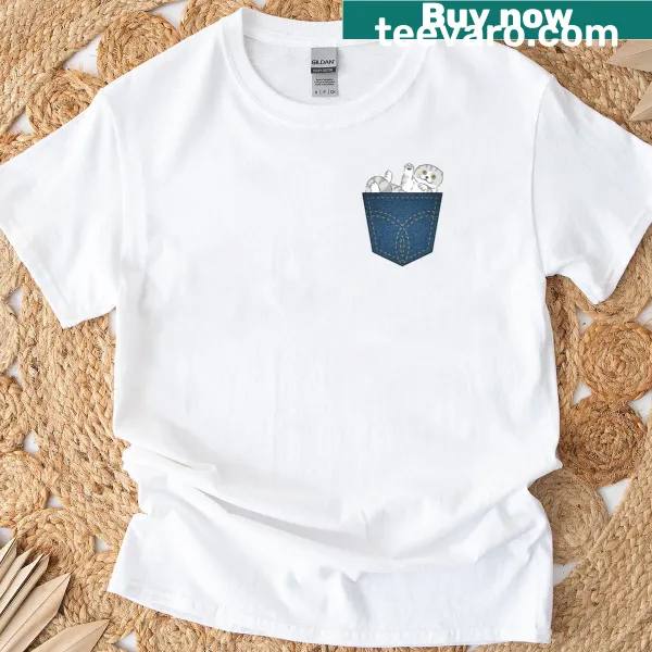 Illustration of a Scottish Fold cat peeking from a pocket on a t-shirt