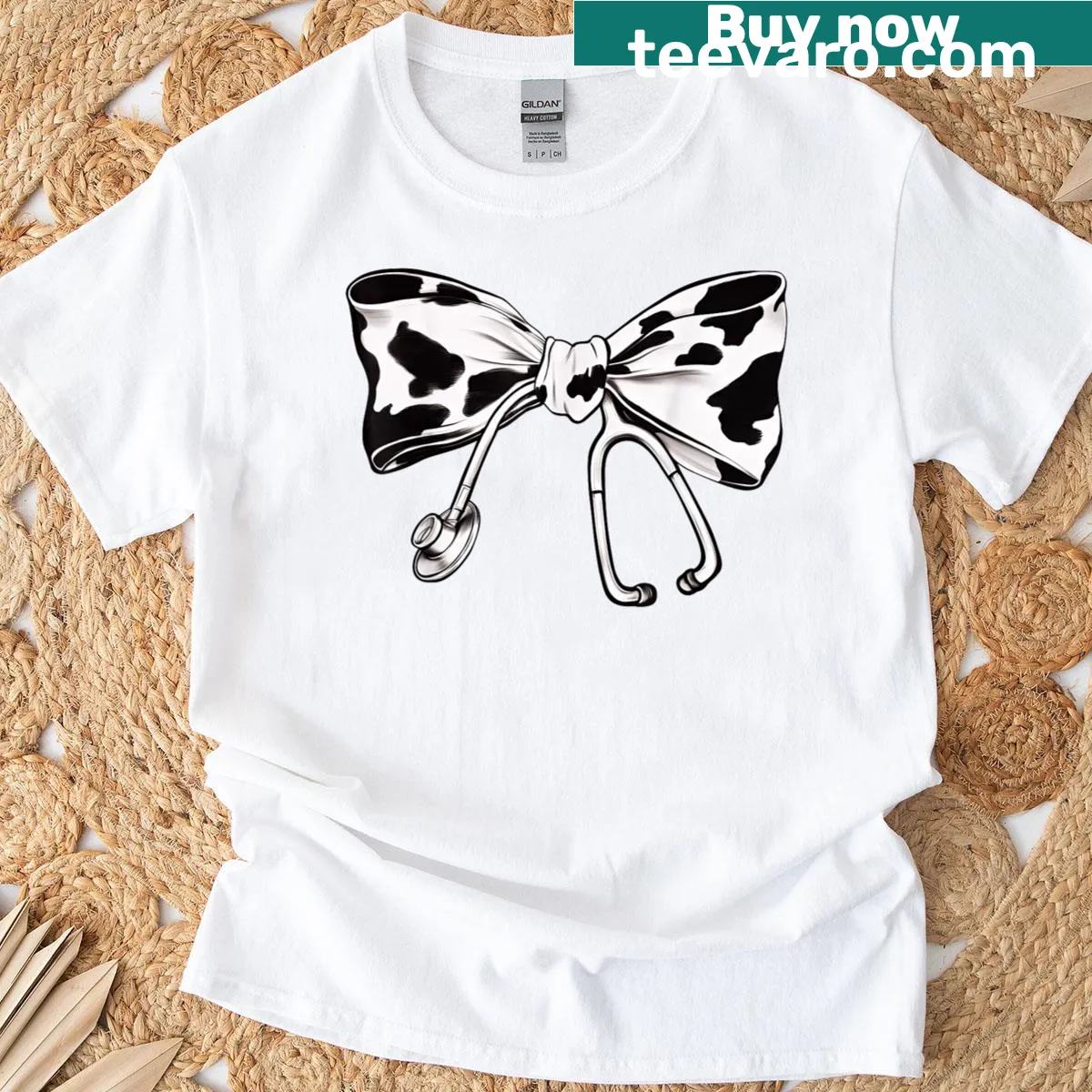 Nurse T-shirt featuring cow print bow and stethoscope design — on a men's t-shirt