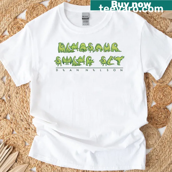 T-shirt with a fun dinosaur playing on a swing set