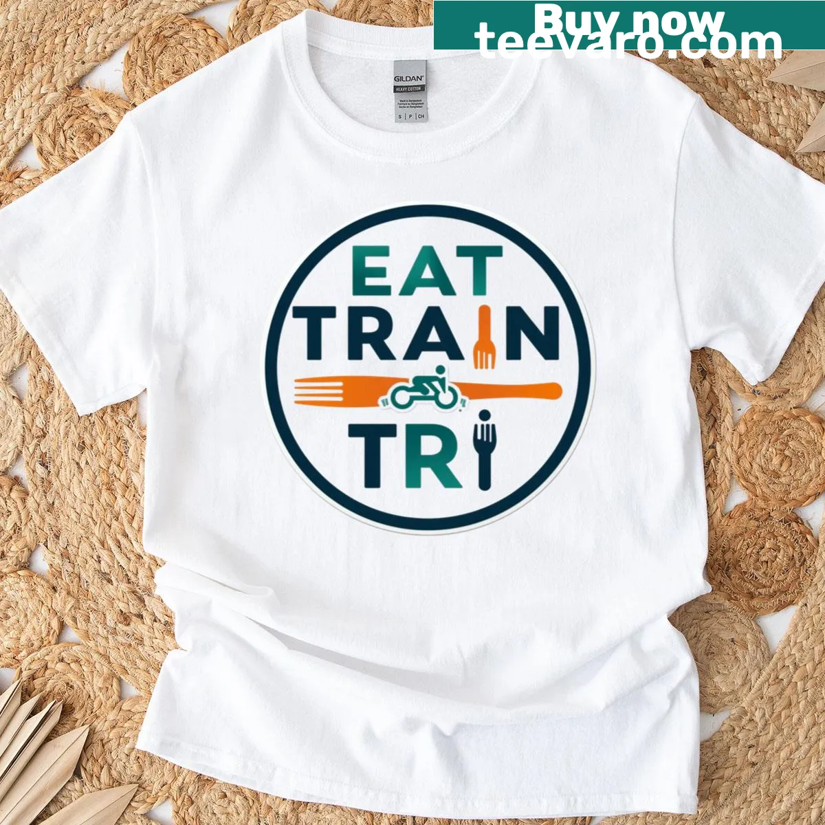 Inspirational T-shirt for triathletes with 'Eat Train Tri' message, motivational design — on a men's t-shirt