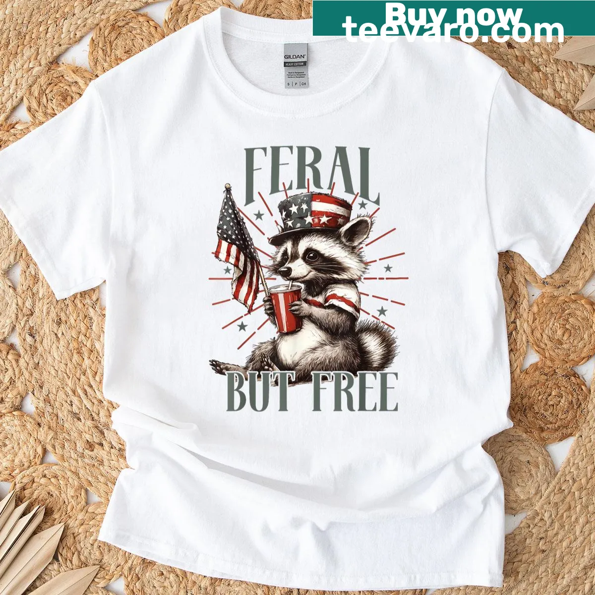 Funny t-shirt for Fourth of July saying 'Feral But Free.' — on a men's t-shirt