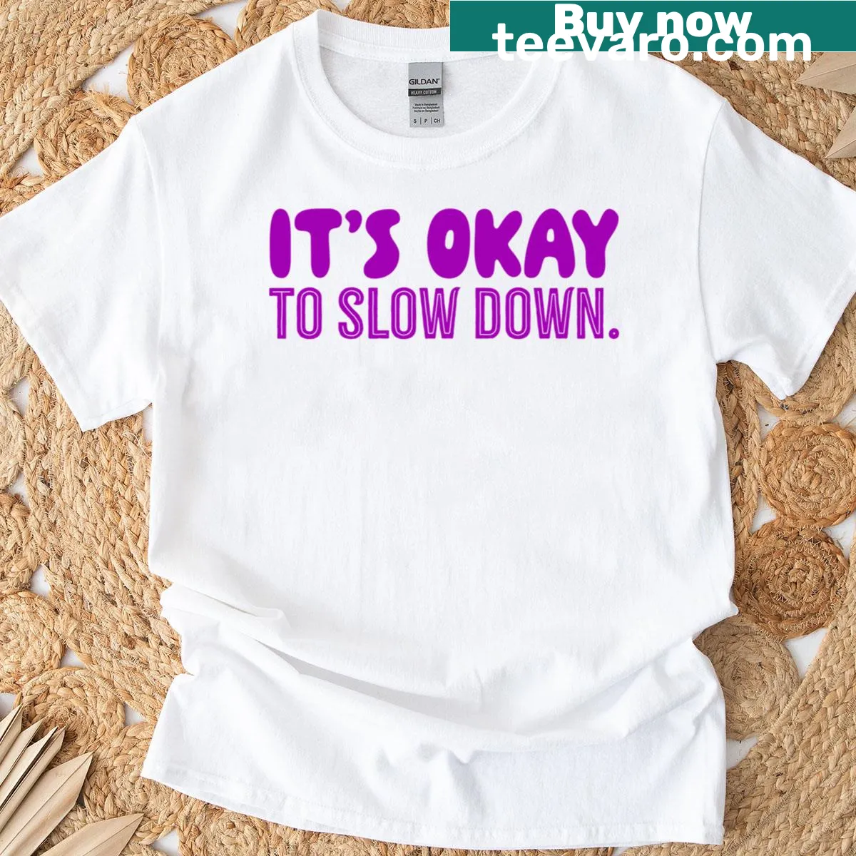 Violet t-shirt featuring a calming 'It's Okay To Slow Down' message — on a men's t-shirt