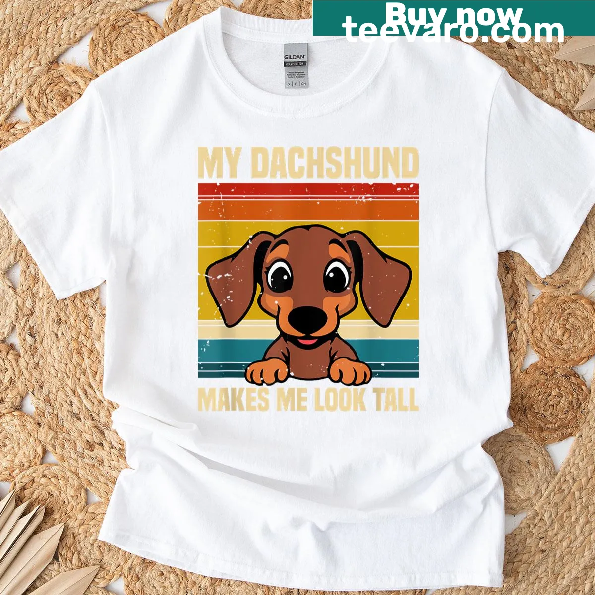 Funny T-shirt saying 'My Dachshund Makes Me Look Tall' — on a men's t-shirt