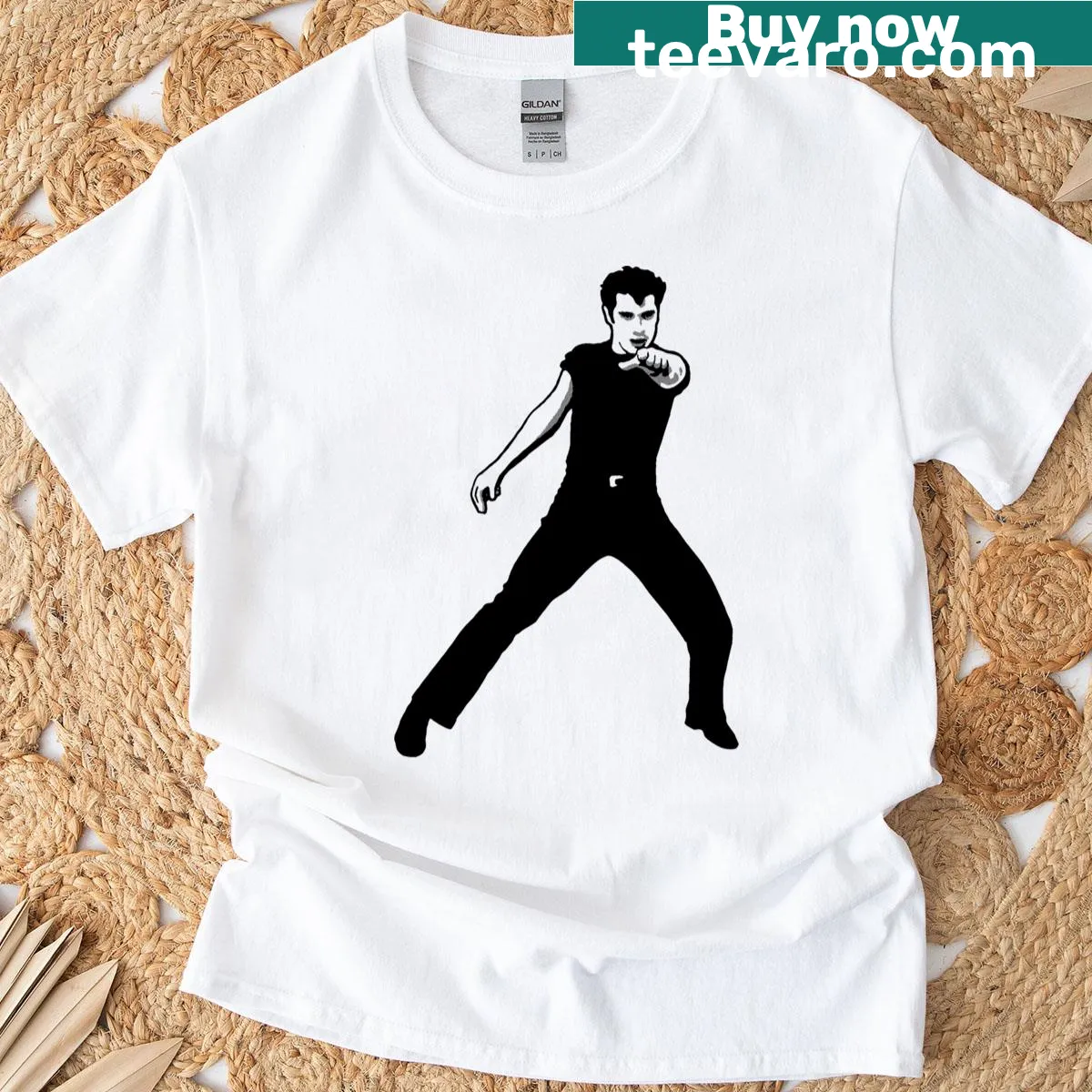 Minimalist T-shirt featuring a travel-themed silhouette graphic — on a men's t-shirt