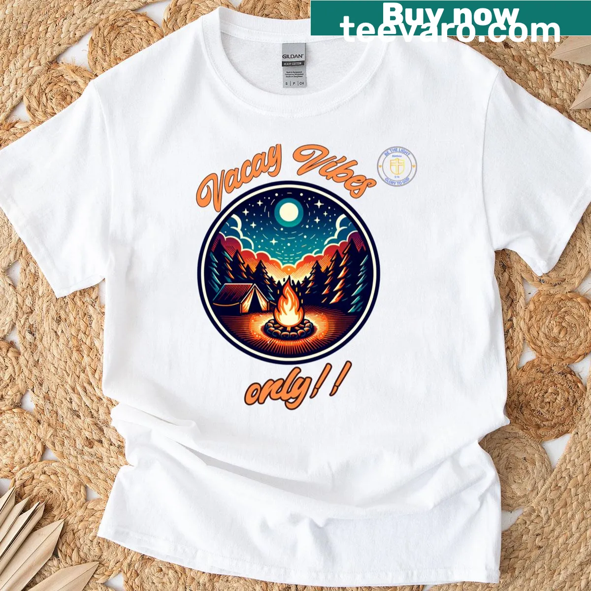 Graphic tee featuring campfire and beach adventure themes. — on a men's t-shirt
