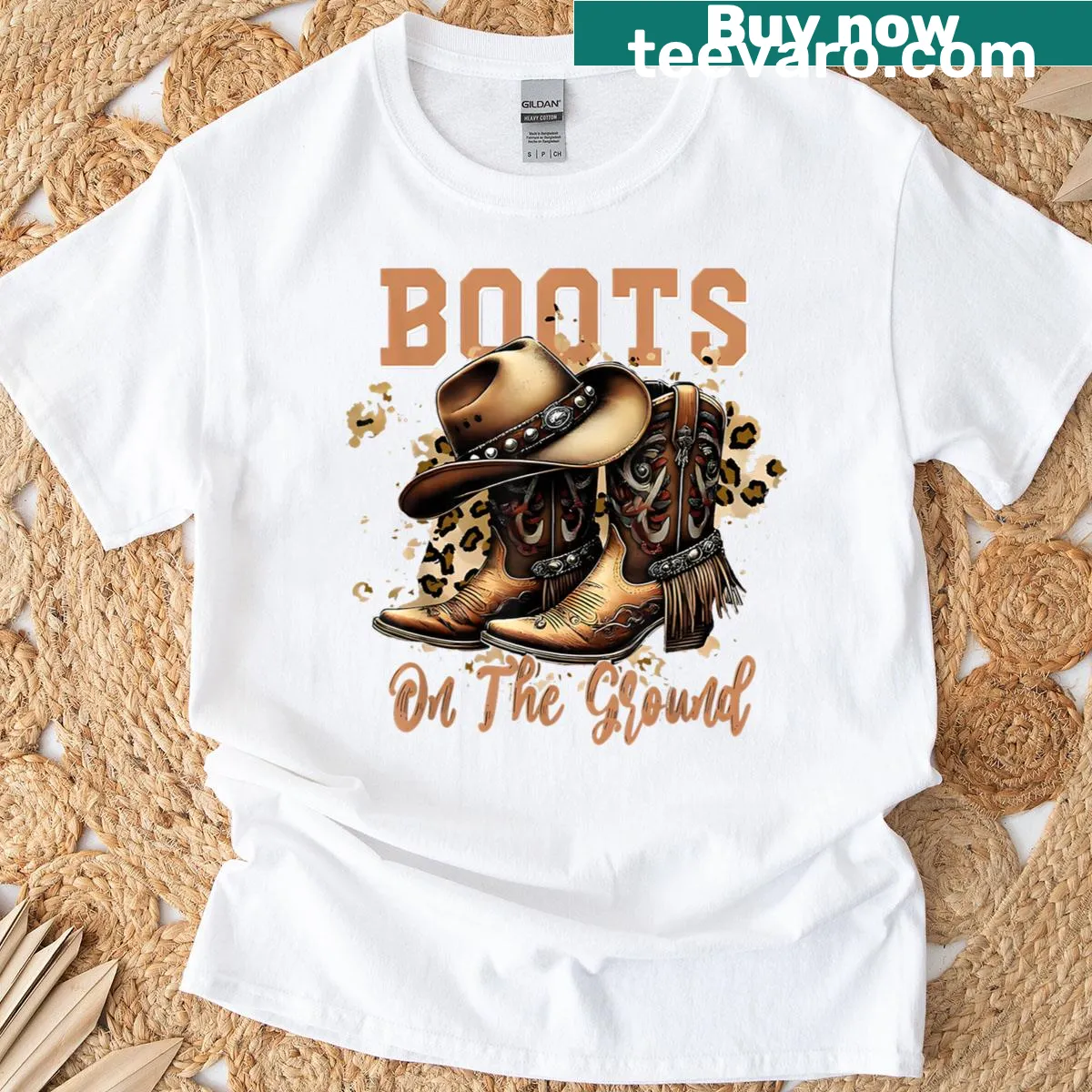 Graphic of cowboy boots on a Western-themed T-shirt — on a men's t-shirt