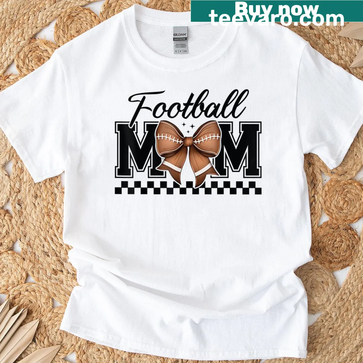 Football Mom t-shirt with coquette bow and 'Mama' text — on a men's t-shirt