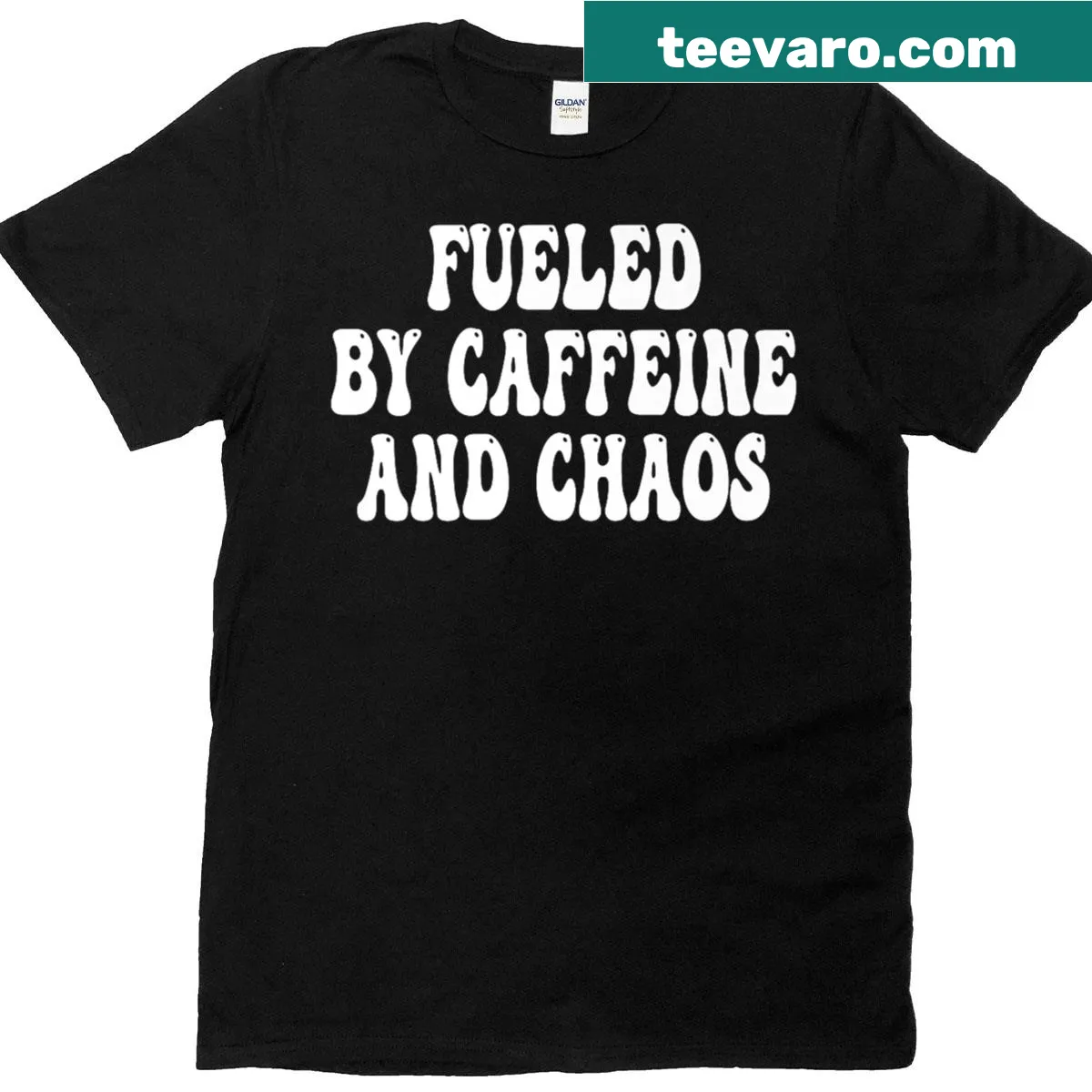 Premium T-shirt with humorous coffee saying Fueled By Caffeine And Chaos — on a men's t-shirt