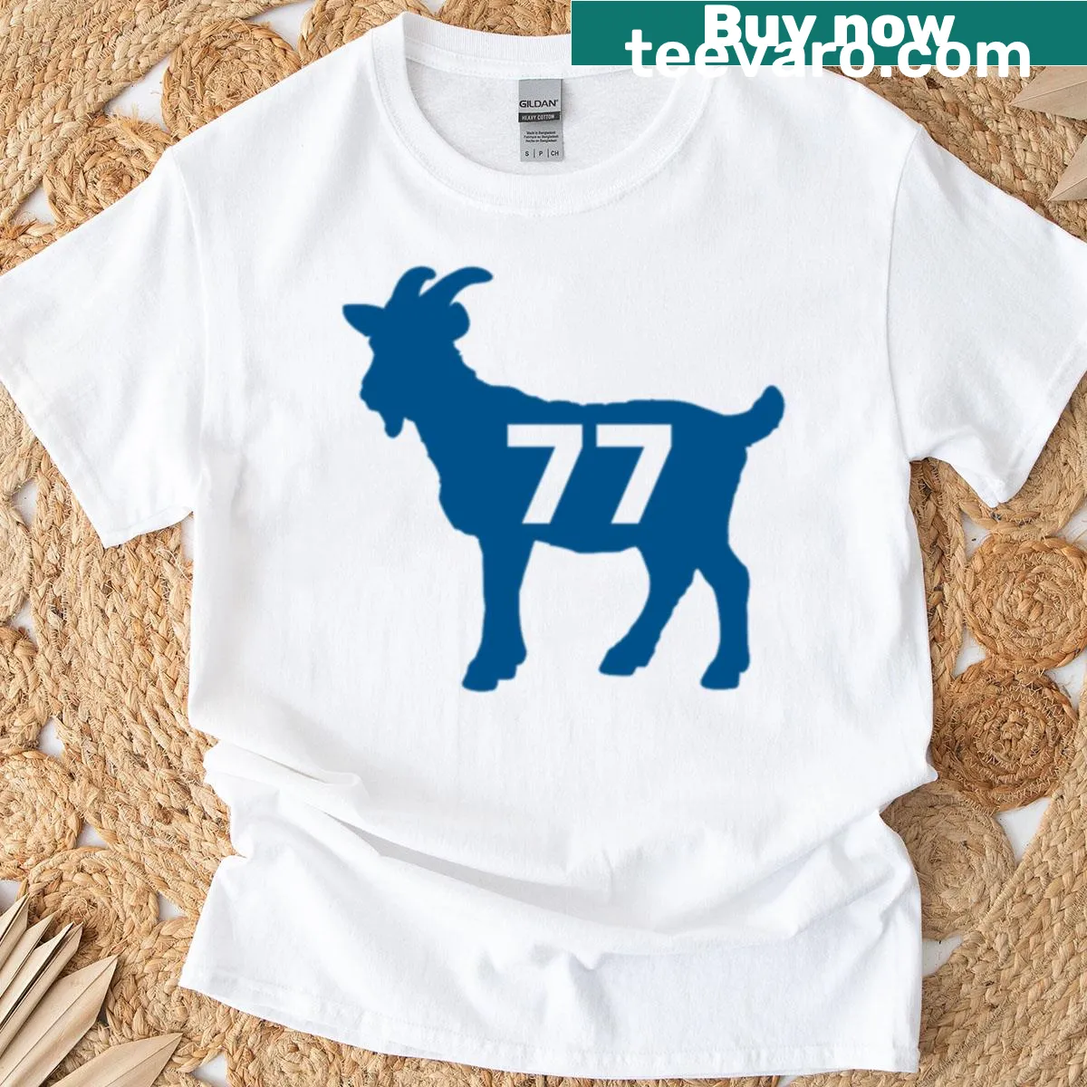 Playful illustration of a goat with the number 77 on the shirt — on a men's t-shirt