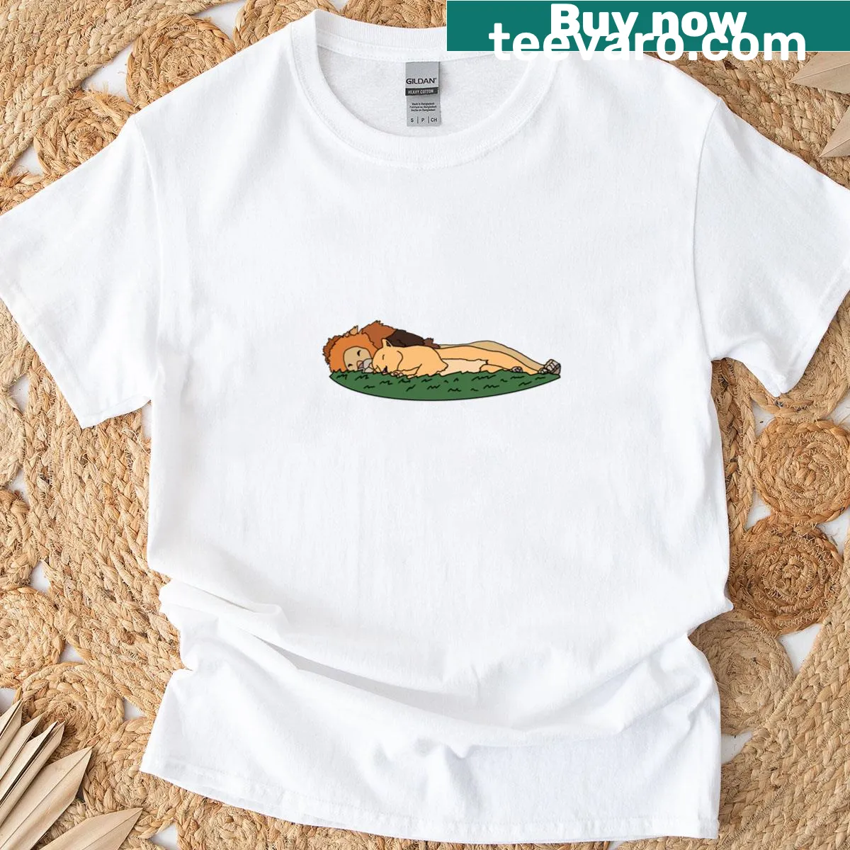 Illustrated lion on grass design T-shirt for nature lovers — on a men's t-shirt