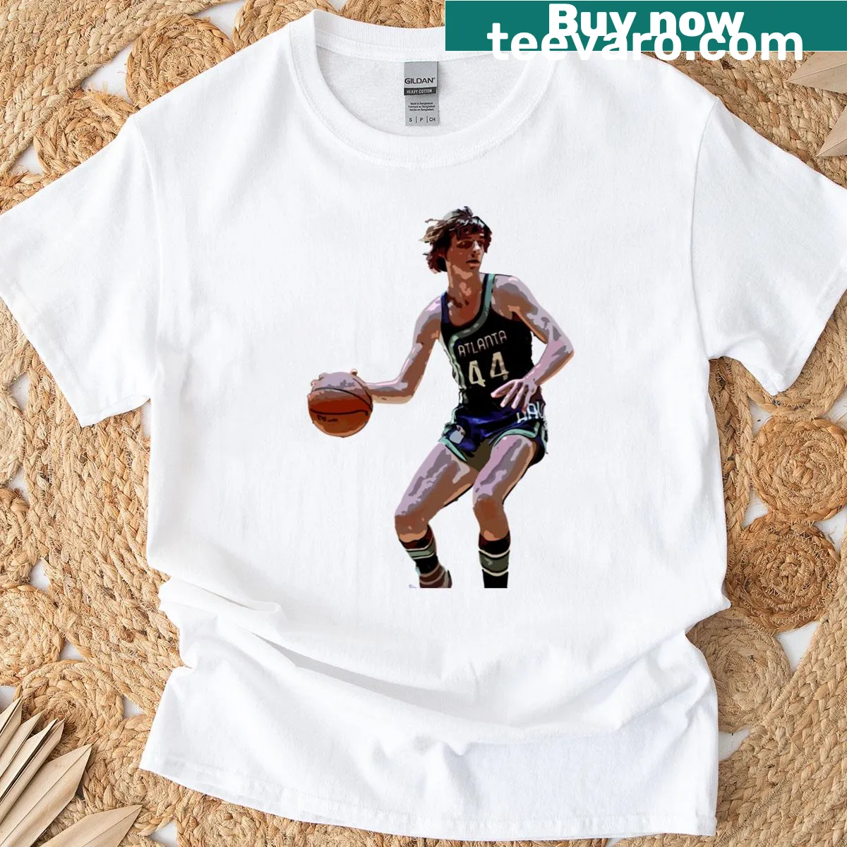 Graphic T-shirt honoring basketball player Pistol Pete Maravich — on a men's t-shirt