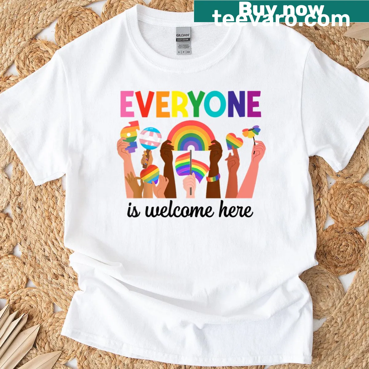 T-shirt featuring rainbow graphics and inclusive message — on a men's t-shirt