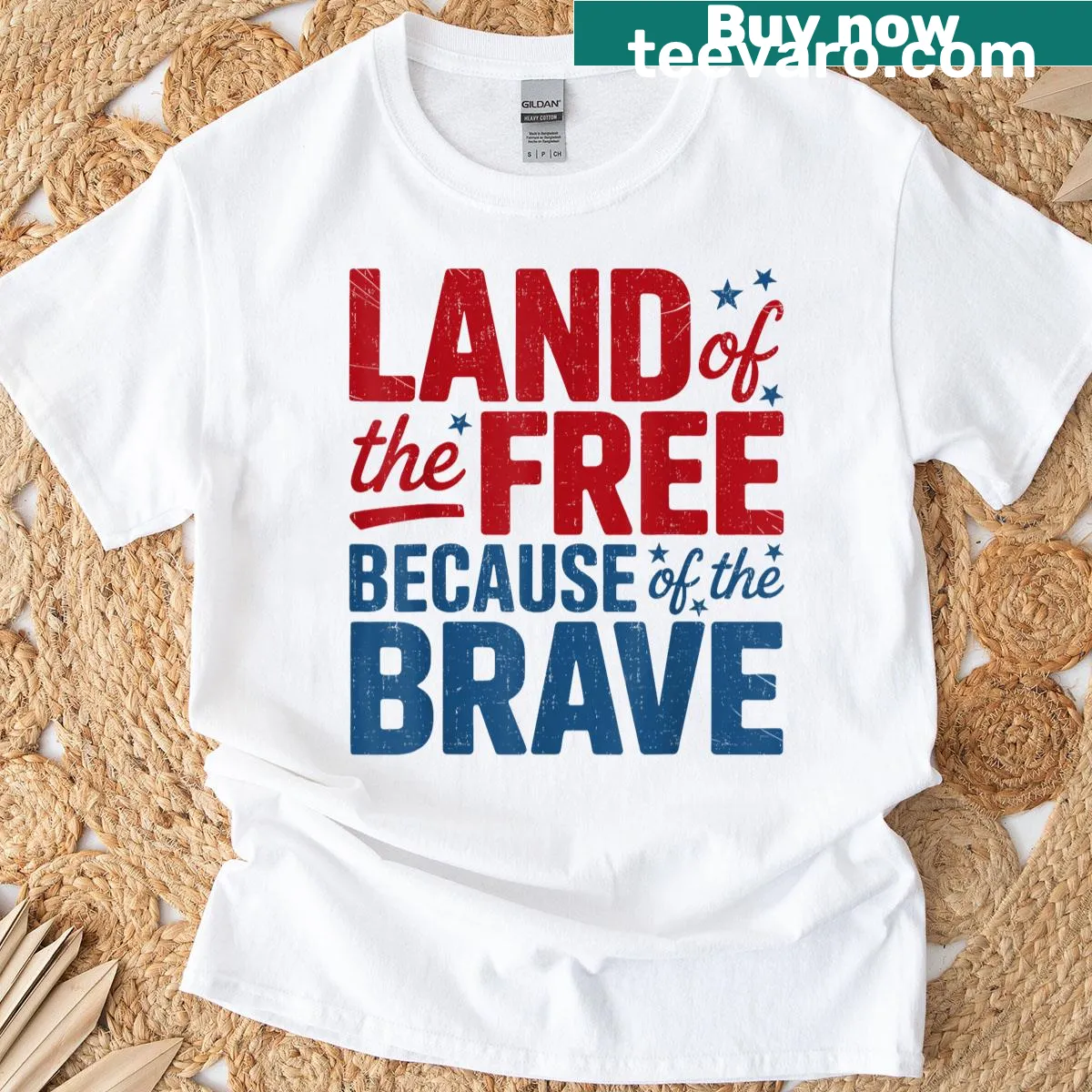 Patriotic t-shirt with 'Land Of The Free Because Of Brave' text — on a men's t-shirt