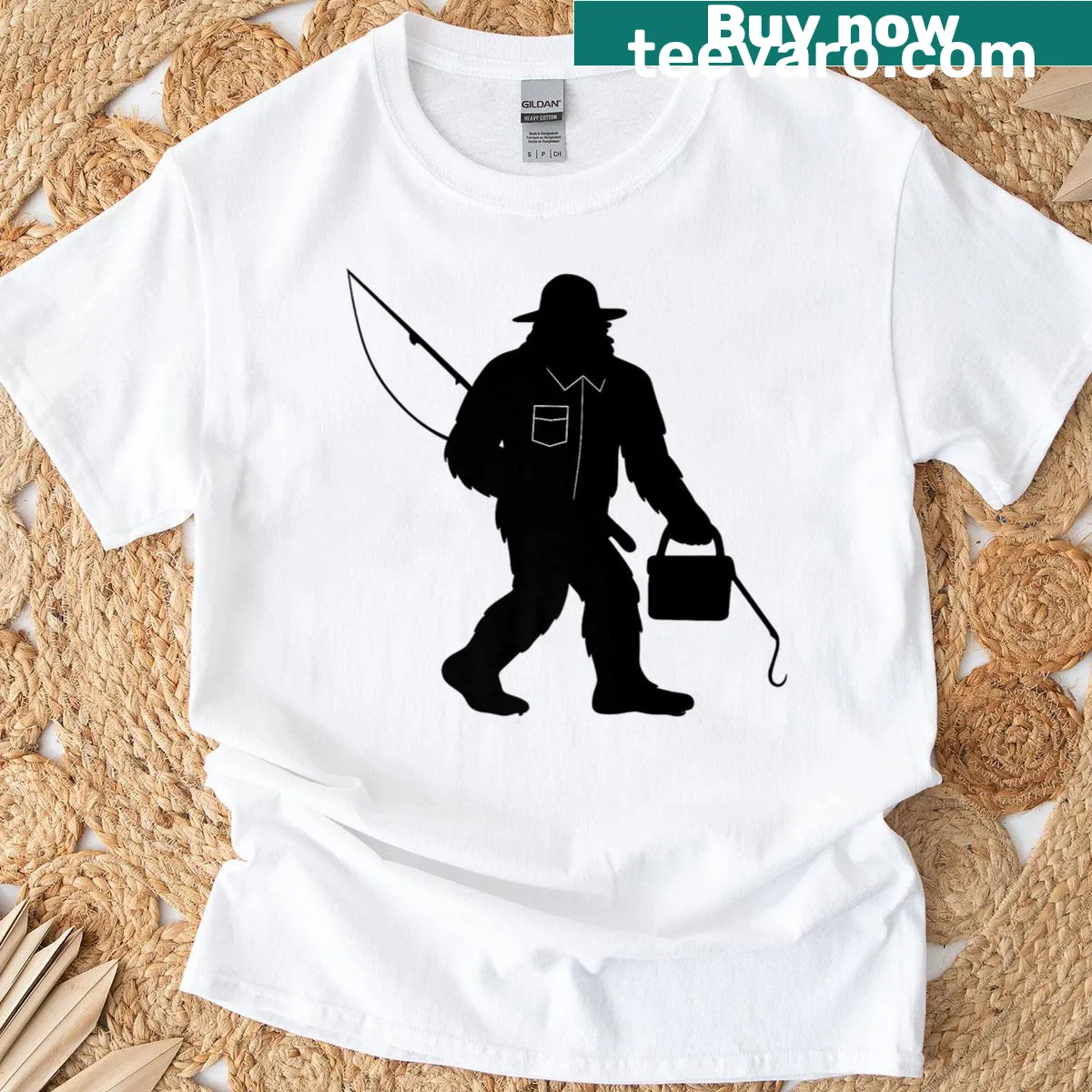 Cartoon Sasquatch fishing, emphasizing a fun outdoor theme — on a men's t-shirt