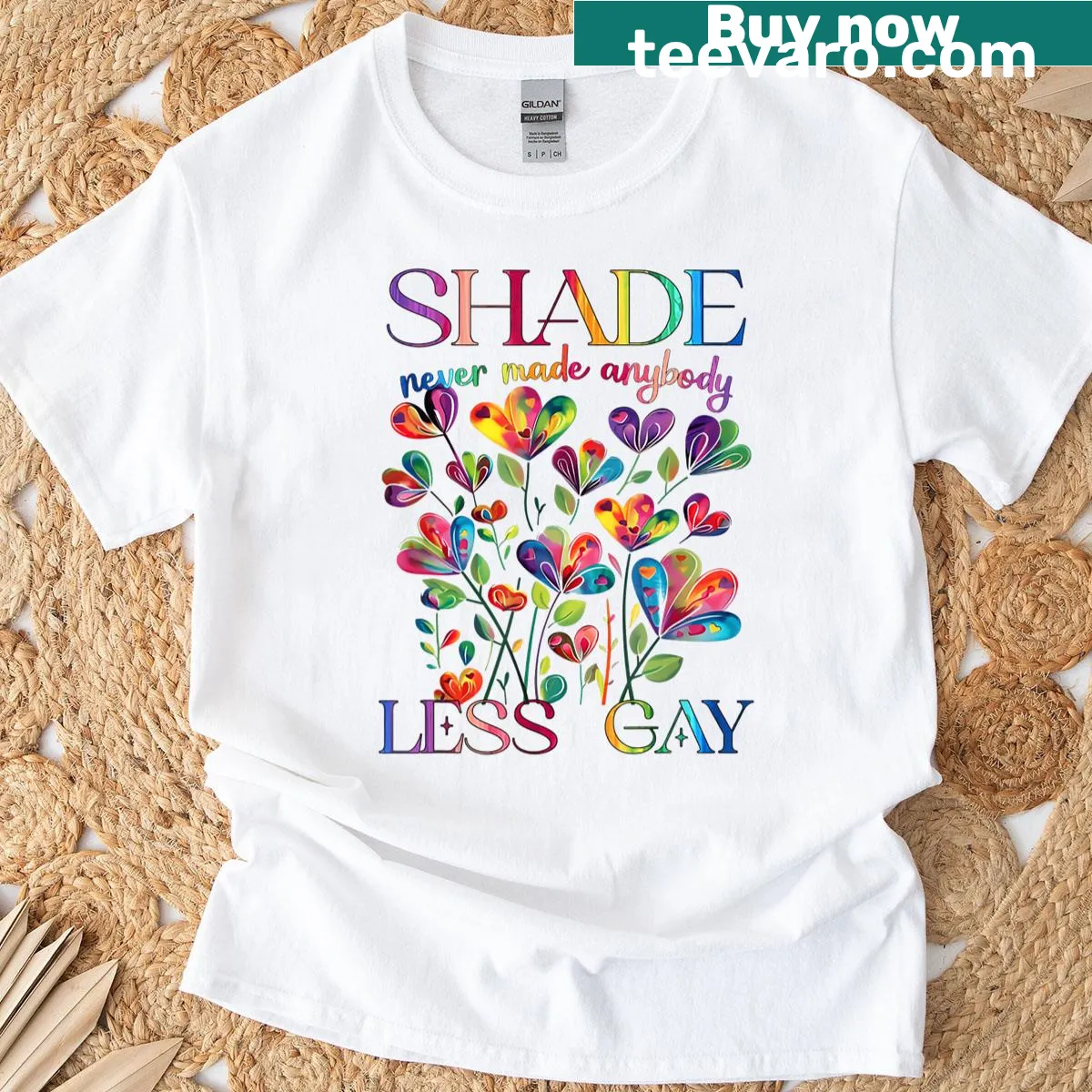Playful t-shirt with floral design and LGBTQ+ pride message — on a men's t-shirt