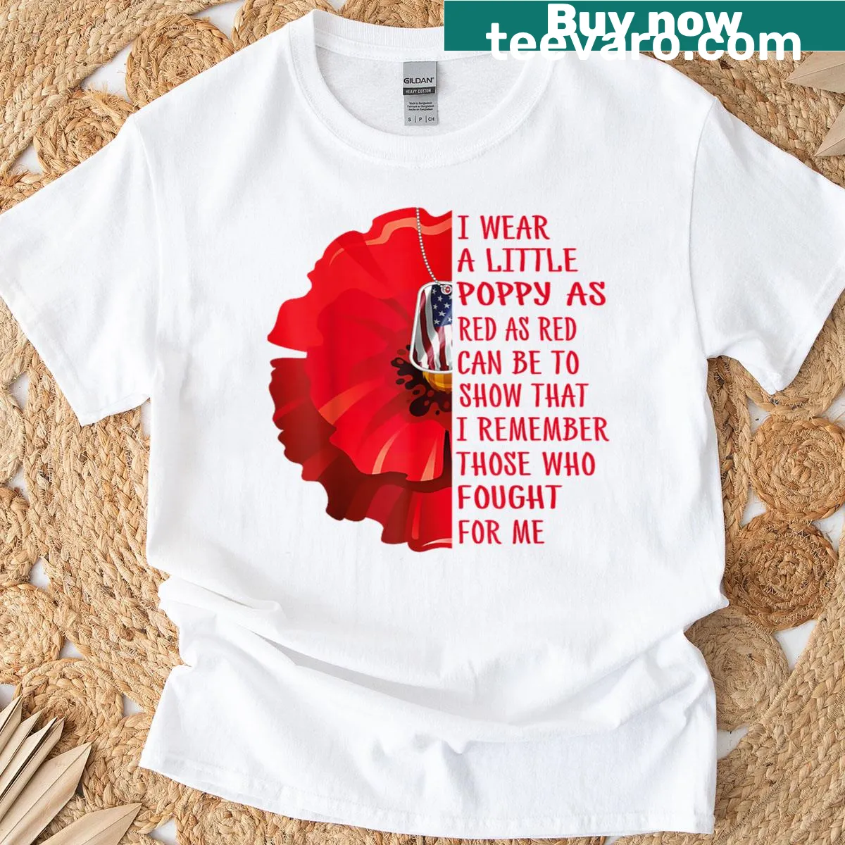 Memorial T-shirt featuring red poppy flower and 'Lest We Forget' text — on a men's t-shirt
