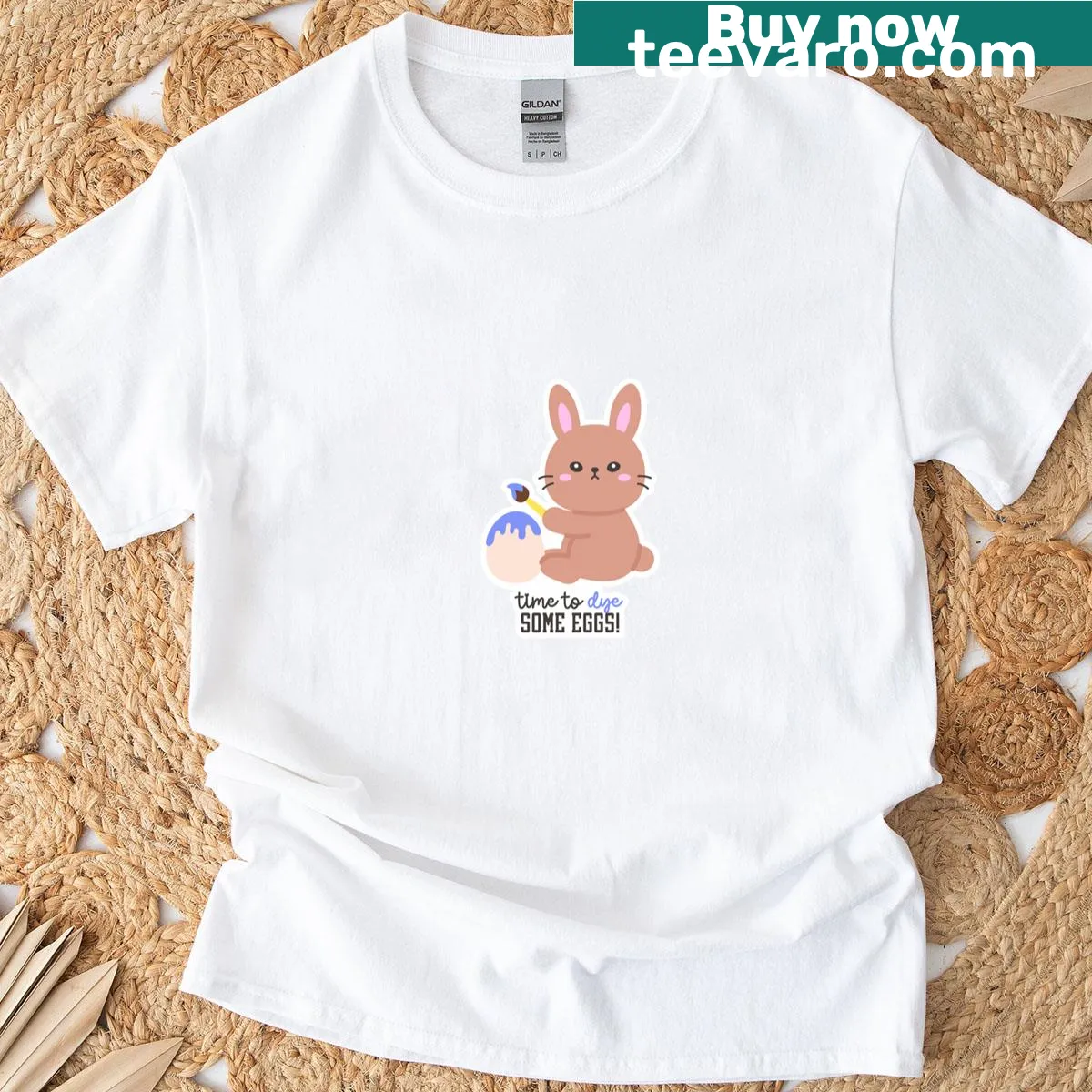 Cute bunny painting Easter eggs design on a T-shirt — on a men's t-shirt