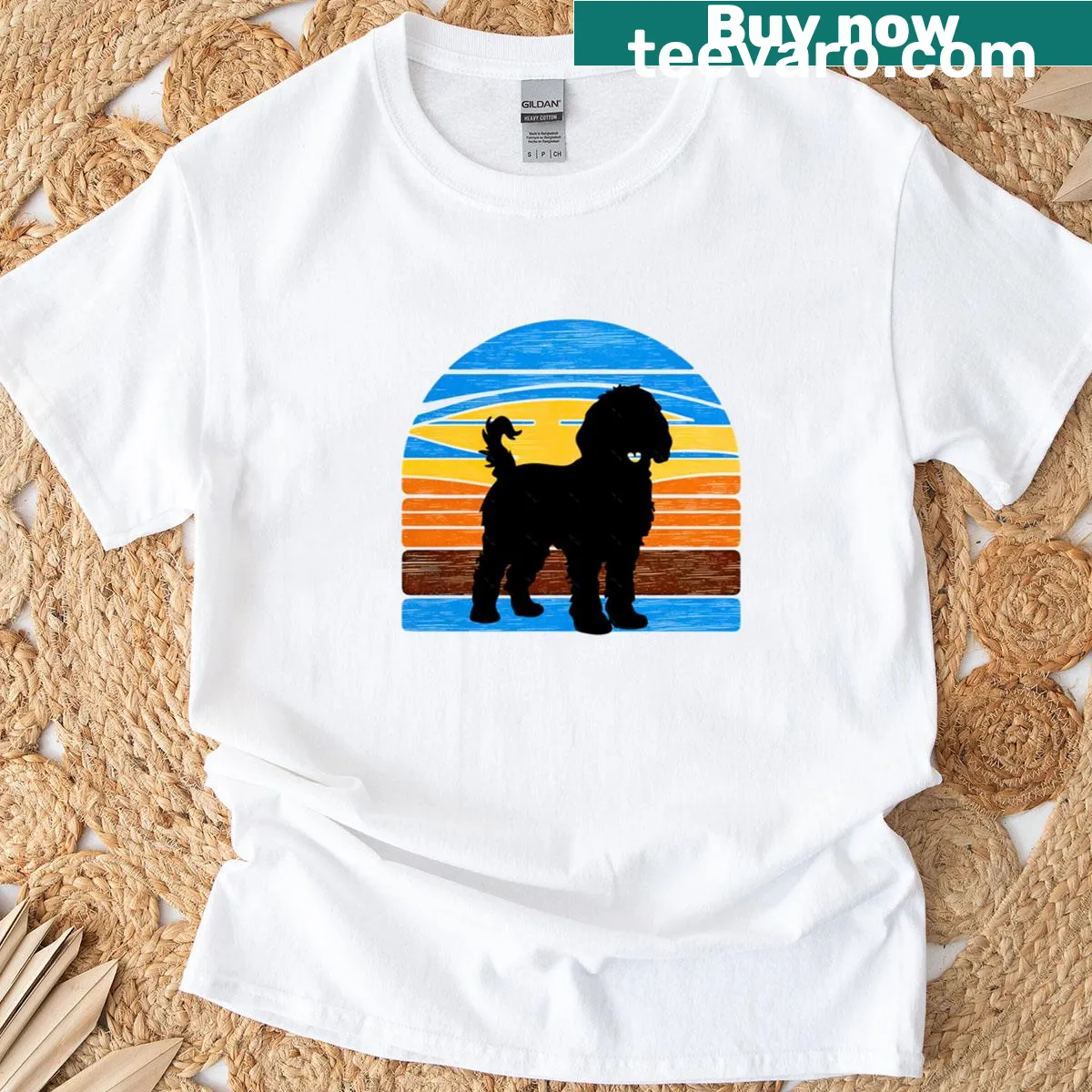 Silhouette of a Goldendoodle against a vintage sunset background — on a men's t-shirt
