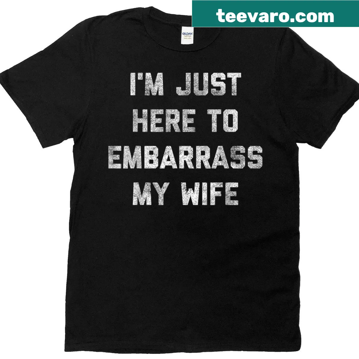 Funny shirt reads 'I'm Just Here To Embarrass My Wife' for husbands. — on a men's t-shirt
