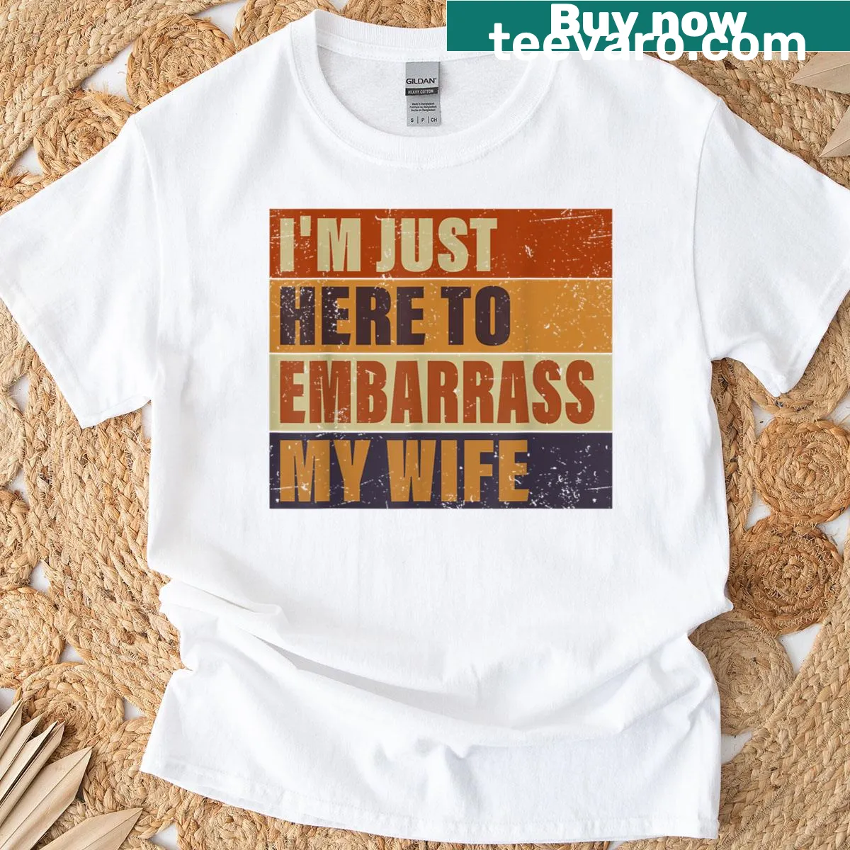 Funny t-shirt for husbands saying I'm Just Here To Embarrass My Wife — on a men's t-shirt
