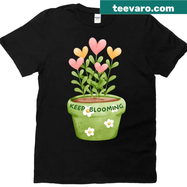 Floral design with Keep Blooming text on a t-shirt