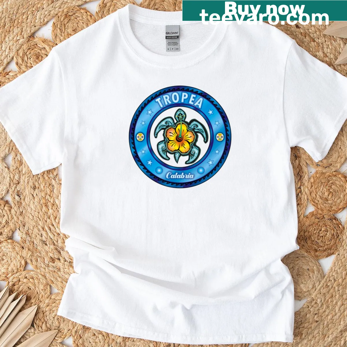 Illustrated T-shirt with a sea turtle and hibiscus flowers — on a men's t-shirt