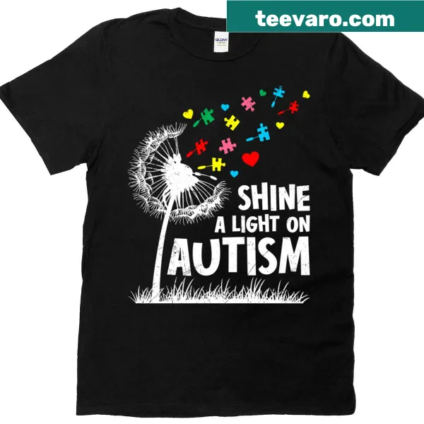 Dandelion graphic with text promoting autism awareness on a T-shirt