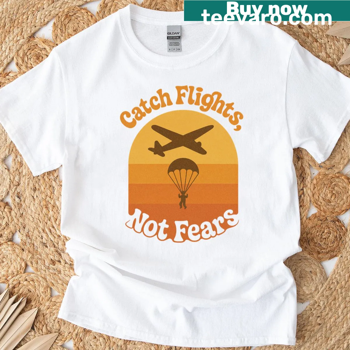 Retro skydiving adventure t-shirt with the phrase 'Catch Flights Not Fears' — on a men's t-shirt