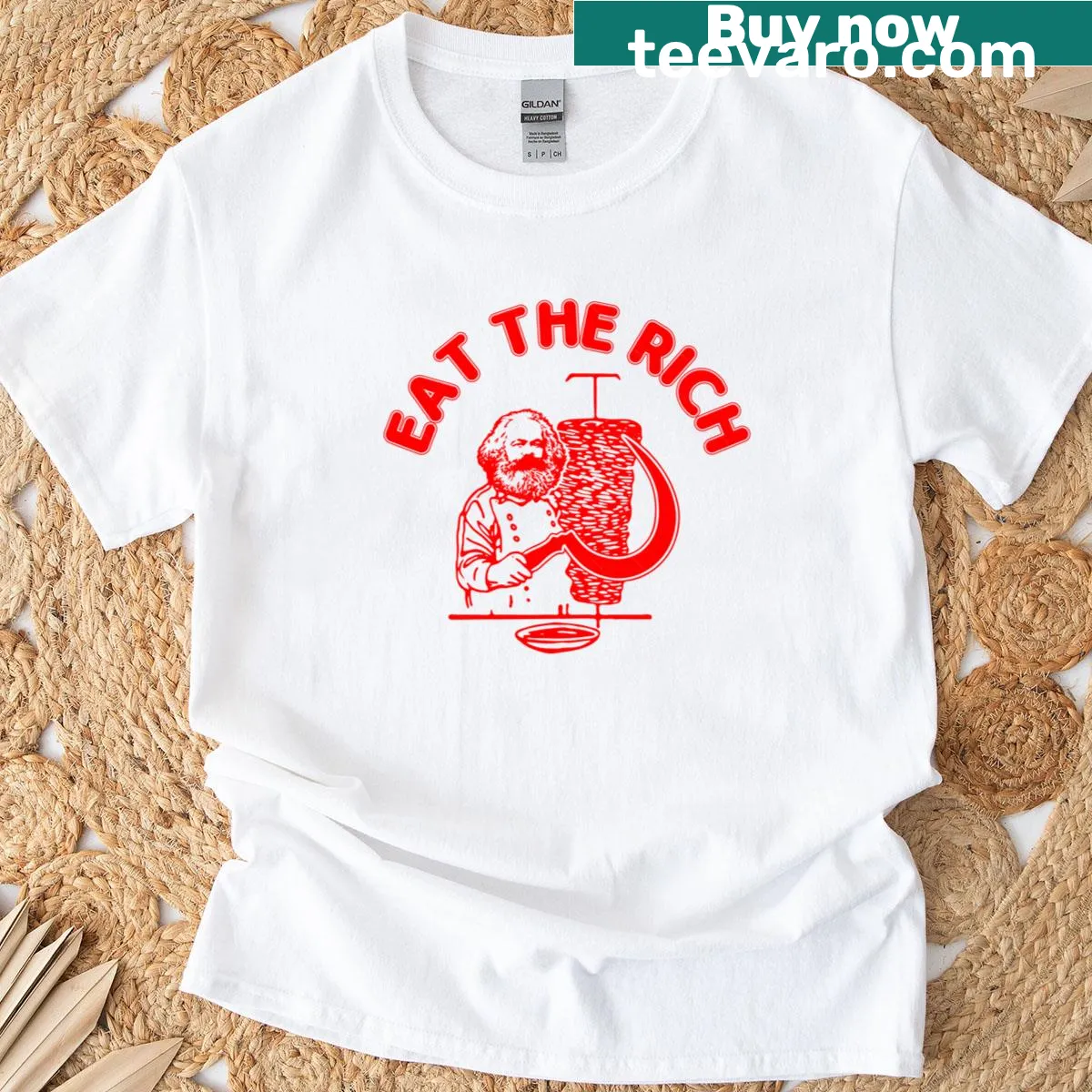 Edgy Eat The Rich T-shirt with humor and political commentary — on a men's t-shirt