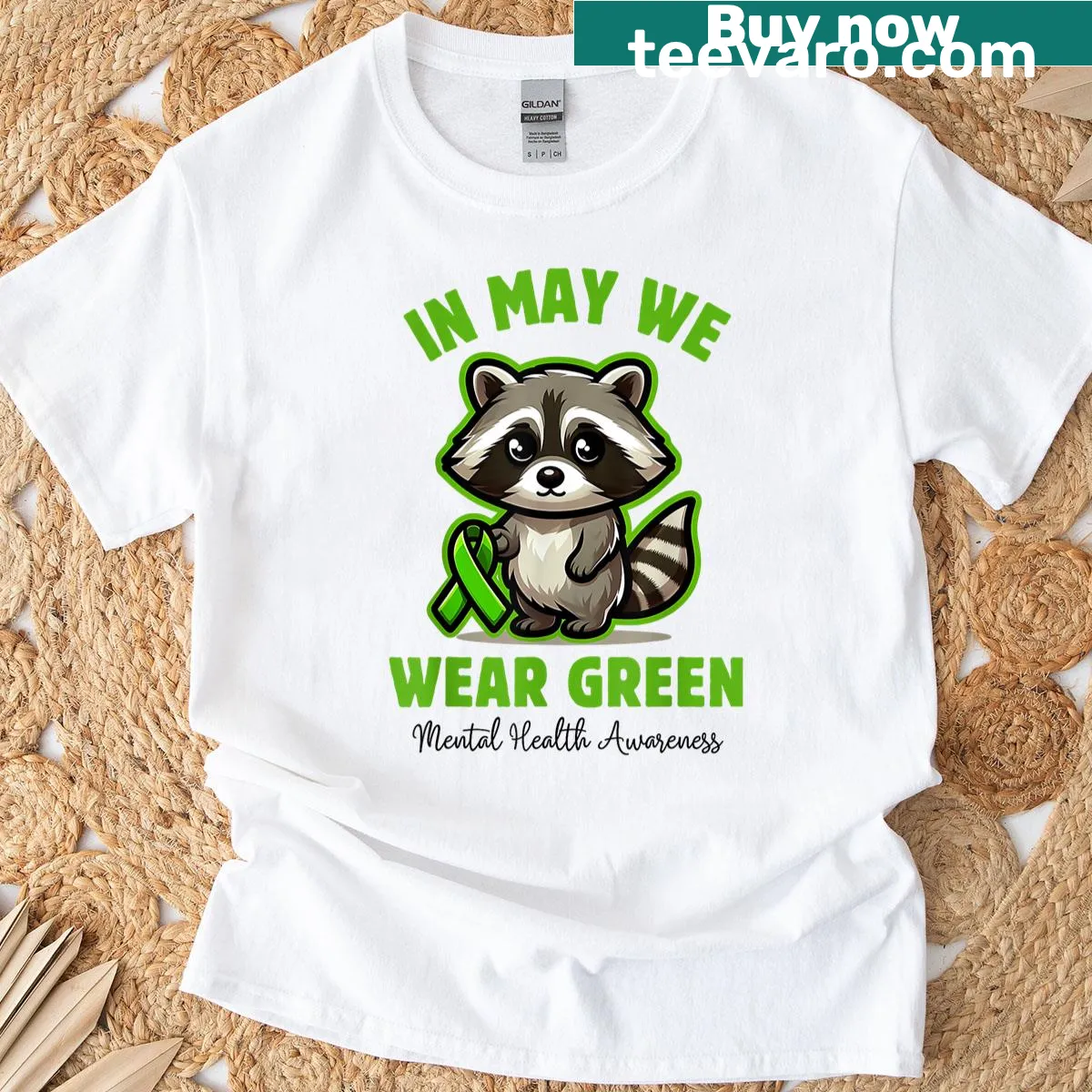 T-shirt featuring a raccoon illustration for mental health awareness — on a men's t-shirt