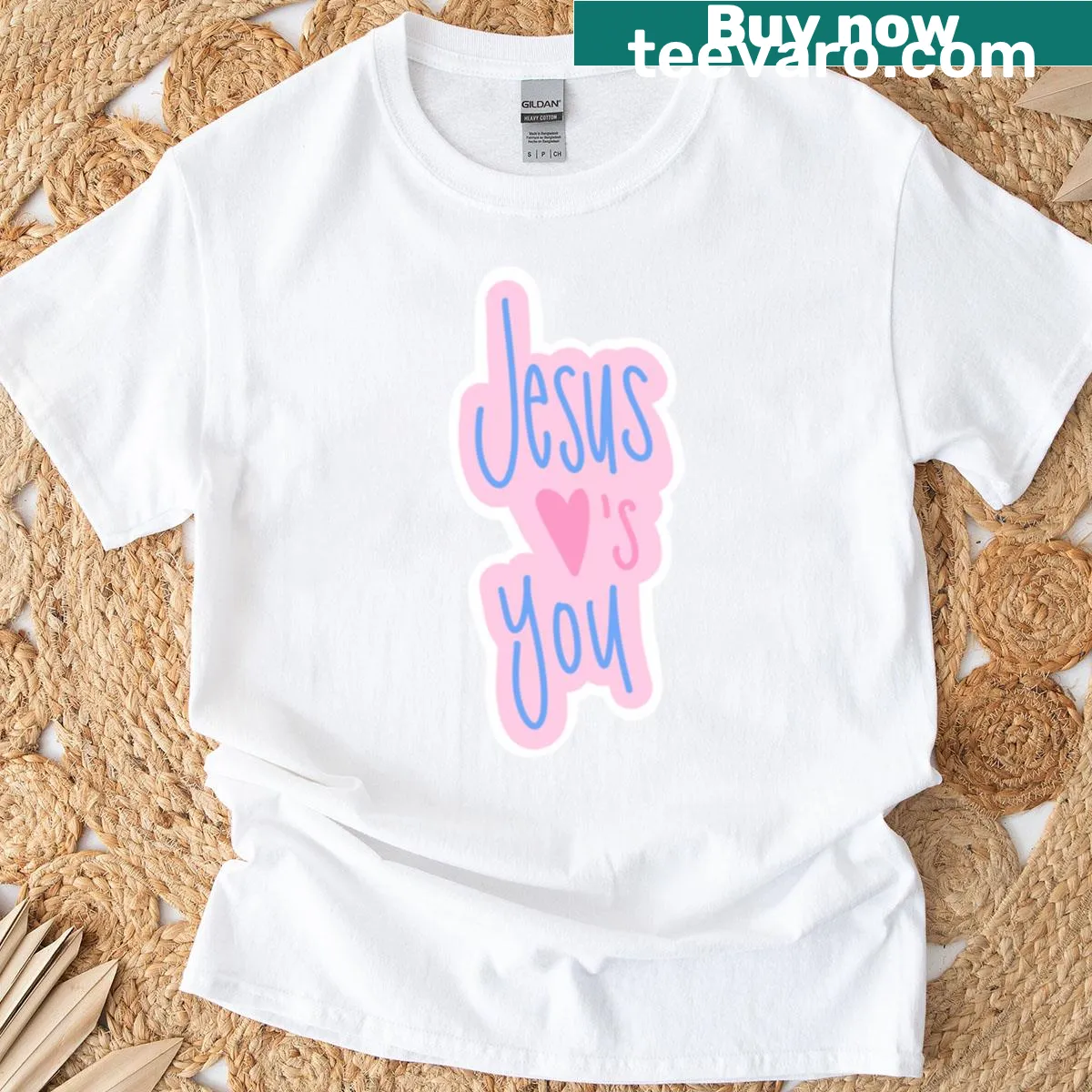 Typographic design stating 'Jesus Loves You' on a t-shirt — on a men's t-shirt