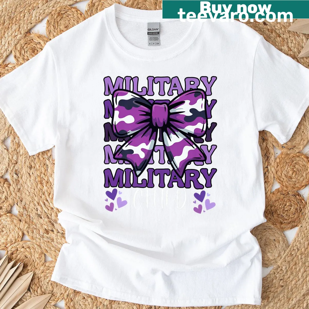 Camo print T-shirt with coquette bow illustration for kids — on a men's t-shirt