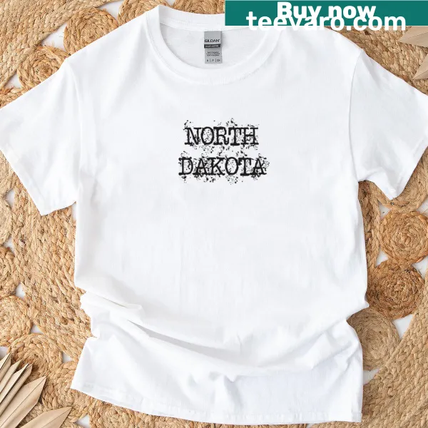 Illustrative T-shirt depicting North Dakota's landscapes and wildlife