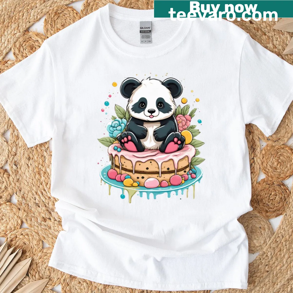 Cute panda on cake graphic t-shirt — on a men's t-shirt