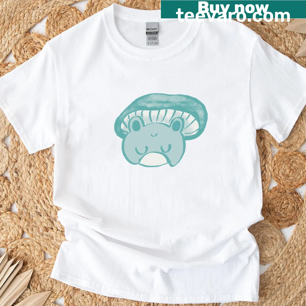 Cute baby blue frog t-shirt with playful illustration — on a men's t-shirt