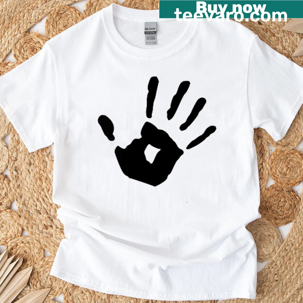 Minimalist palm tree silhouette design on black t-shirt — on a men's t-shirt