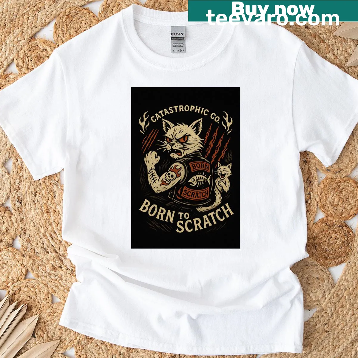 Whimsical Cat Scratch t-shirt with claw marks and a cat design. — on a men's t-shirt
