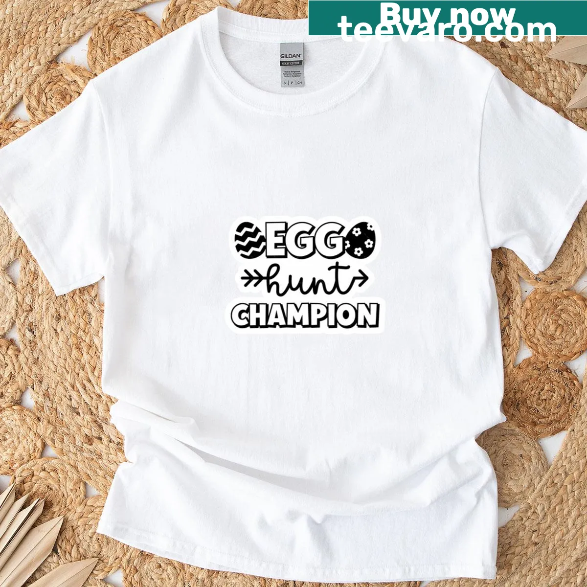 Egg Hunt Champion T-shirt with egg and arrow graphic — on a men's t-shirt