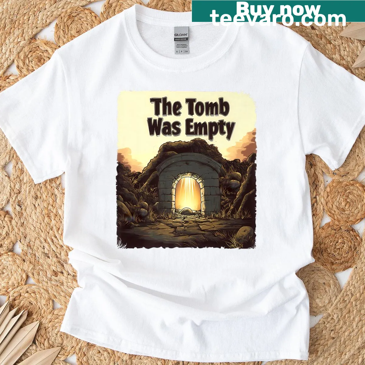 Easter-themed t-shirt with the phrase 'Empty Tomb' and sunrise graphic — on a men's t-shirt