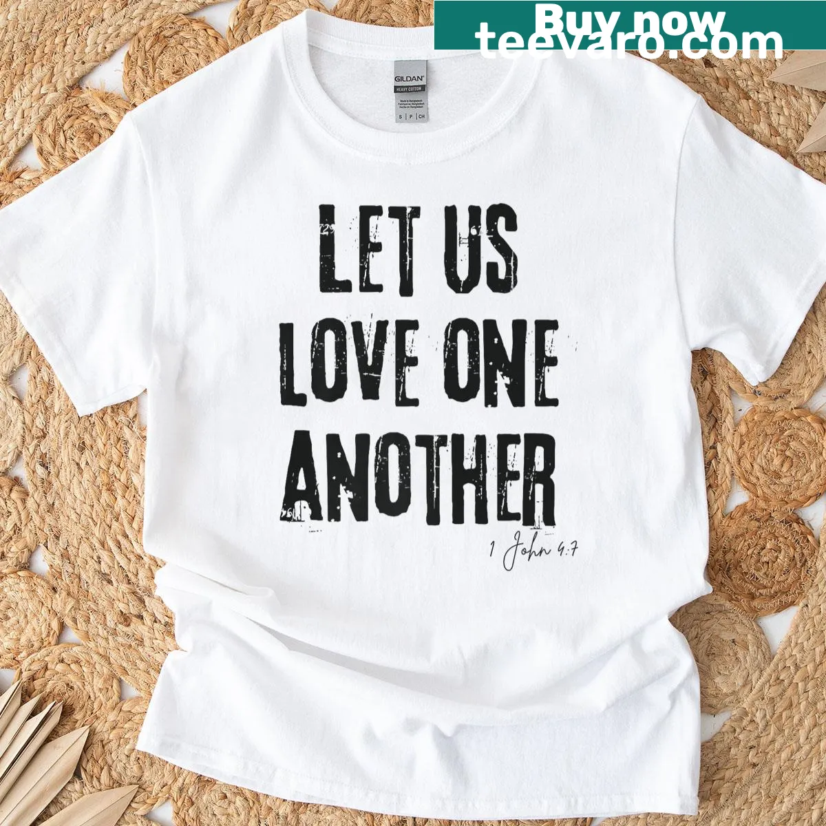 T-shirt with the Bible verse Let Us Love One Another from 1 John 4:7 — on a men's t-shirt