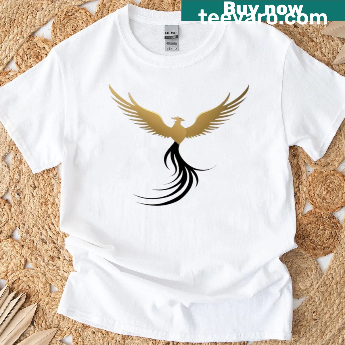 Illustrative T-shirt depicting a majestic phoenix with flowing tail feathers — on a men's t-shirt