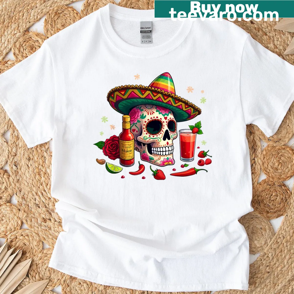 T-shirt featuring a Mexican sugar skull and sombrero illustration — on a men's t-shirt