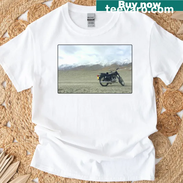 T-shirt featuring a motorcycle in snowy mountains, perfect for travel lovers