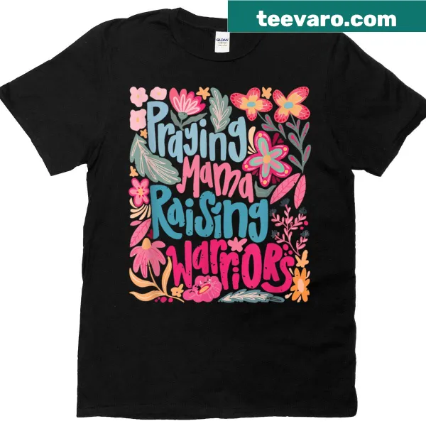 T-shirt celebrating moms with 'Praying Mama Raising Religious Warriors' text.