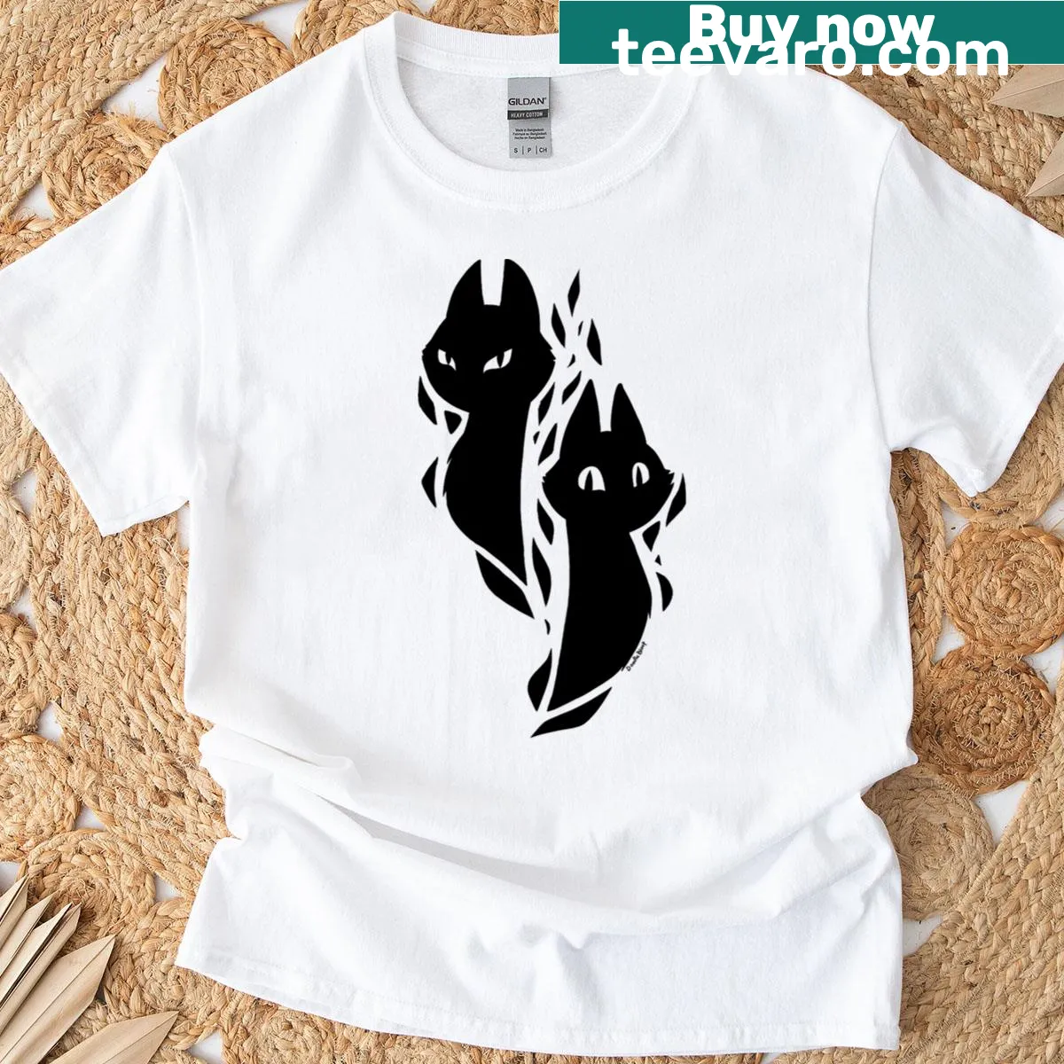 Two black cats silhouette illustration on T-shirt — on a men's t-shirt