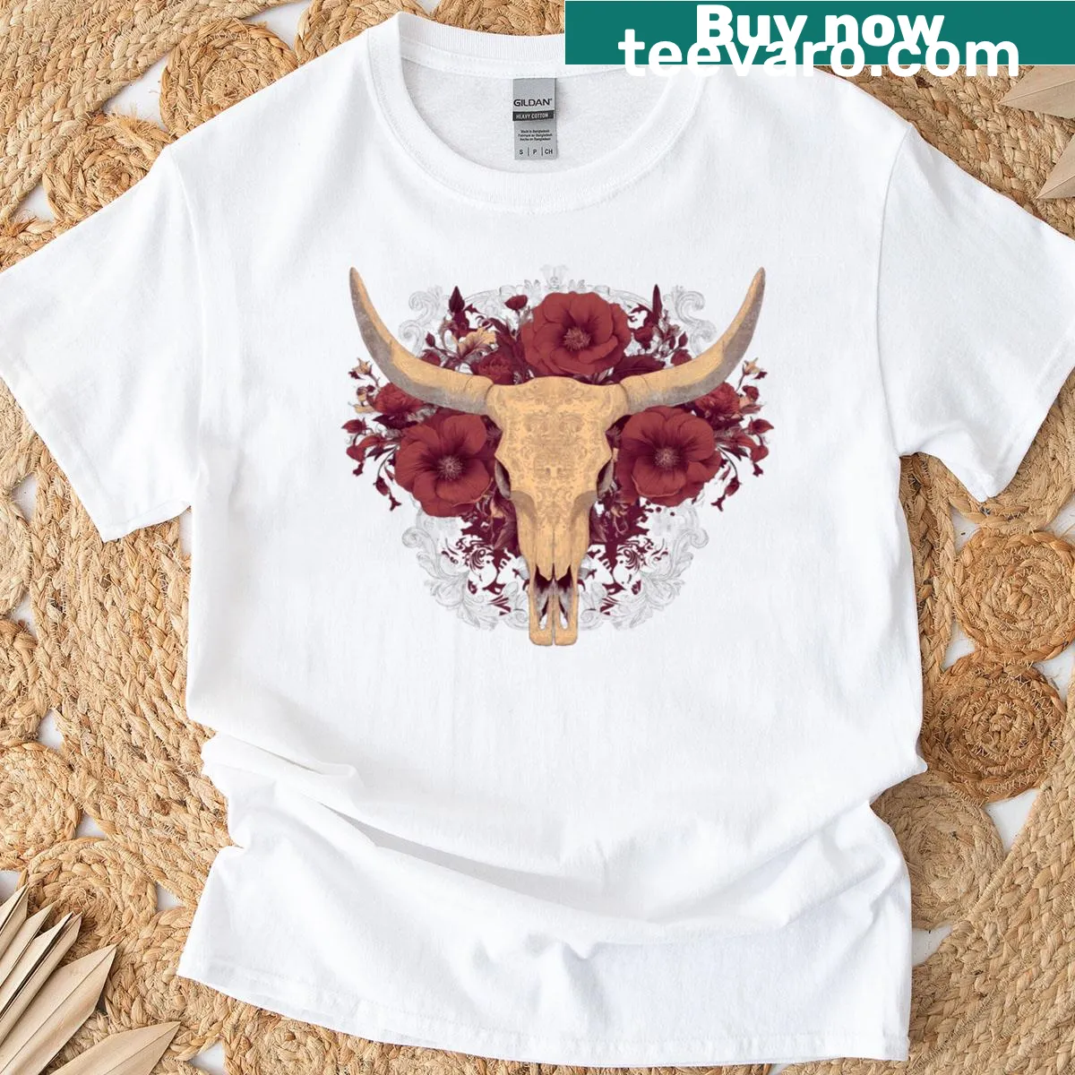 Cow skull design surrounded by floral elements on a t-shirt — on a men's t-shirt