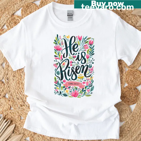 Floral Easter T-shirt with the phrase 'He Is Risen' in cheerful design